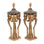 A PAIR OF 19th CENTURY BRONZE AND ORMOLU EGYPTIAN STYLE CASSOLETTES designed for potpourri, the