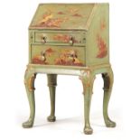 A 19TH CENTURY QUEEN ANNE STYLE MINIATURE CHINOISERIE BUREAU ON STAND with angled fall revealing a