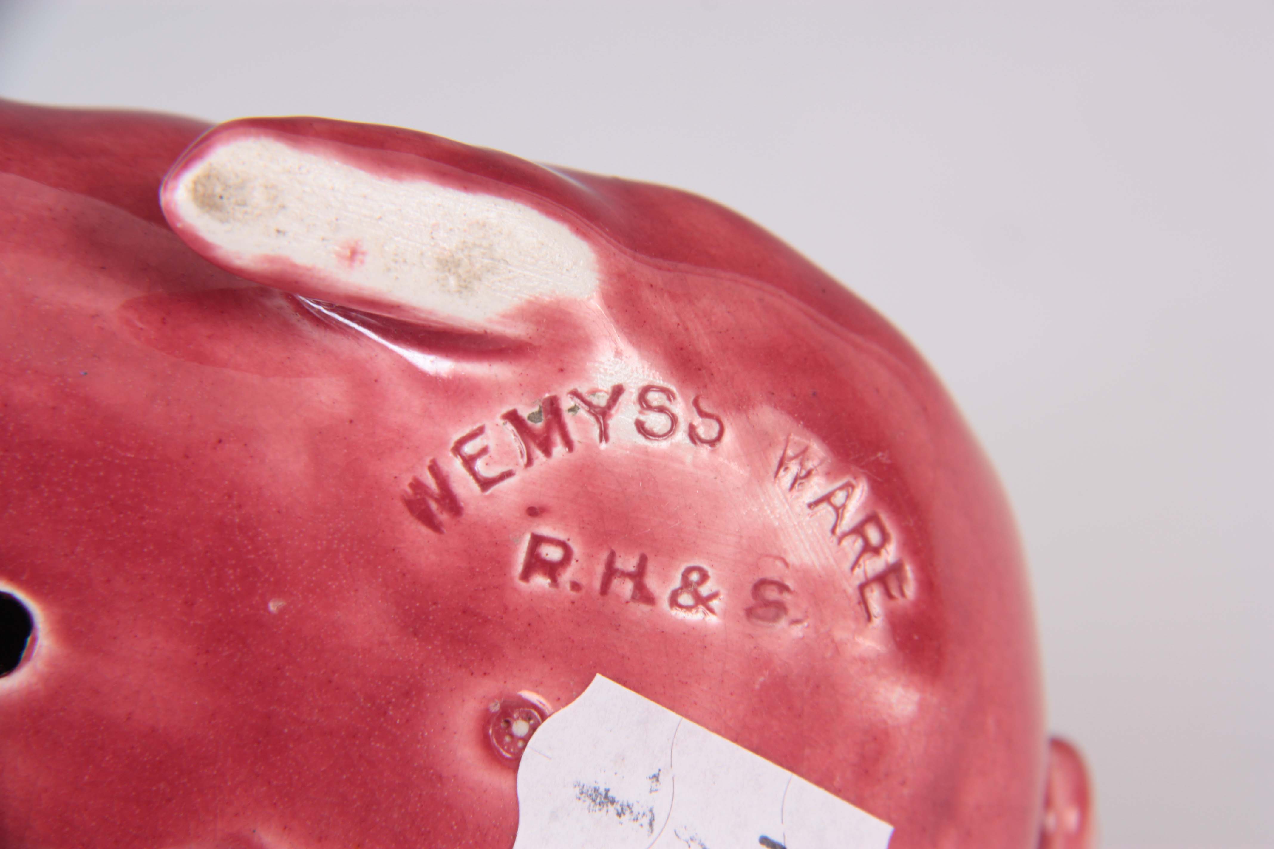 A WEMYSS WARE PIG CIRCA 1900 having a pink glaze with impressed marks to underside 16.5cm wide - Image 4 of 4