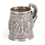 A LATE 19th / EARLY 20th CENTURY INDIAN SILVER TANKARD having high relief decoration of female