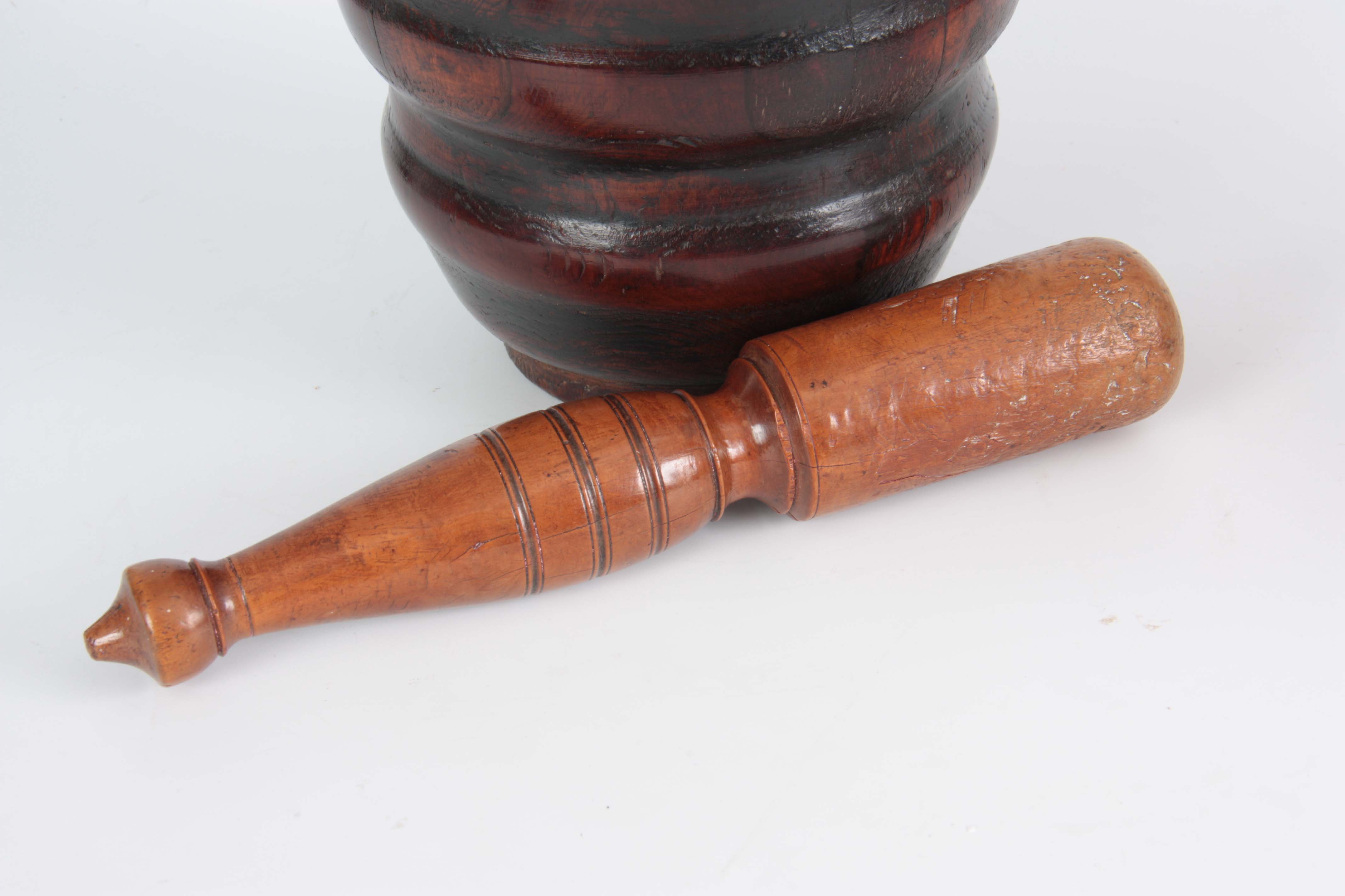 AN 18TH CENTURY YEW-WOOD PESTLE AND MORTAR of ribbed bulbous form with later Pestle 23cm high 20cm - Image 4 of 5