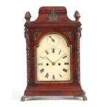 WILLIAM KIPLING, LONDON. A GEORGE III FIGURED MAHOGANY BRACKET CLOCK the bell top case surmounted by