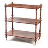 A VICTORIAN BURR WALNUT THREE TIER WHATNOT with rounded corners supported by twisted turned