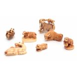 A COLLECTION OF SEVEN EARLY 20TH CENTURY IVORY NETSUKE sculptured as various animals all with