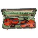 2 VIOLINS AND 4 VIOLIN BOWS IN A DOUBLE VIOLIN CASE including an Italian violin labelled Antonio