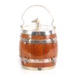 AN EARLY 20th CENTURY OAK AND SILVERPLATED NICKEL ICE BUCKET OF HUNTING INTEREST the oak barrel