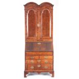 A LATE 17TH / EARLY 18TH CENTURY HERRING BAND STRUNG FIGURED WALNUT BUREAU BOOKCASE of narrow