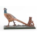 A LATE 19th CENTURY PAINTED METAL SCULPTURE modelled as a pheasant 30.5cm wide
