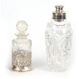 AN EDWARD VII SILVER MOUNTED HEAVY CUT GLASS COCKTAIL SHAKER with pull-off top. Birmingham 1902