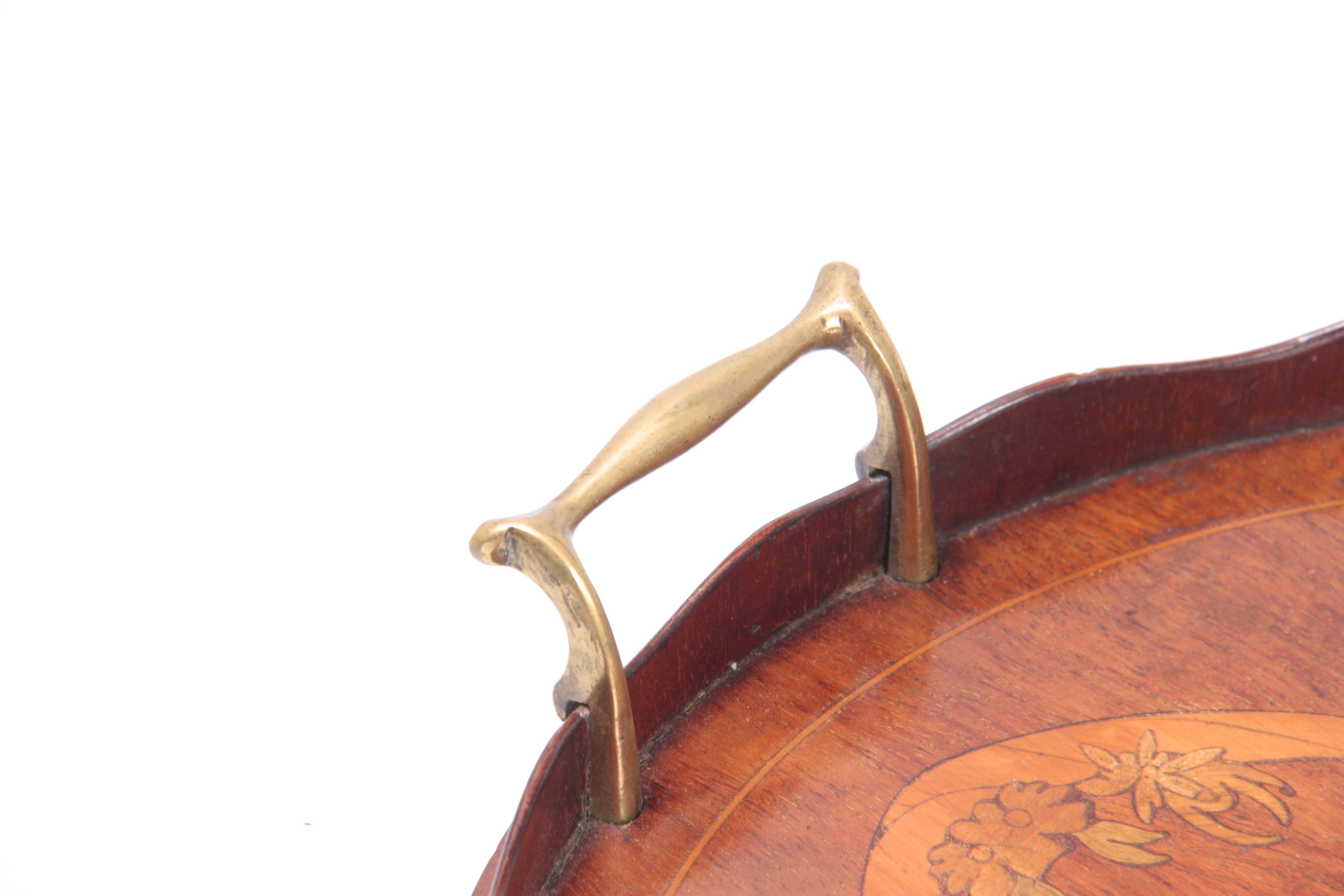 A 19TH CENTURY INLAID MAHOGANY OVAL TRAY with brass side handles and wavey edge gallery 71cm wide - Image 3 of 3
