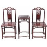 A SUITE OF 19TH CENTURY CHINESE HEAVY HARDWOOD FURNITURE COMPRISING OF TWO SIDE CHAIRS AND AN
