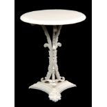 A REGENCY CAST IRON CIRCULAR TABLE with leaf cast base and moulded triform base 55cm diameter 68cm