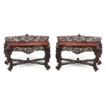 A PAIR OF 19TH CENTURY ANGLO-INDIAN CARVED ROSEWOOD CONSOLE TABLES having pierced foliate ledge