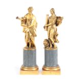 A PAIR OF 19TH CENTURY ITALIAN GRAND TOUR GILT BRONZE STATUES OF COMEDIA AND FORTALEZA mounted on