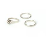 THREE GOLD RINGS to include an 18ct white gold wedding band 2.3g, a platinum wedding band 2.7g,