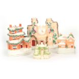 A SELECTION OF FOUR 19TH CENTURY STAFFORDSHIRE HOUSE FIGURINES comprising of one with clocktower -