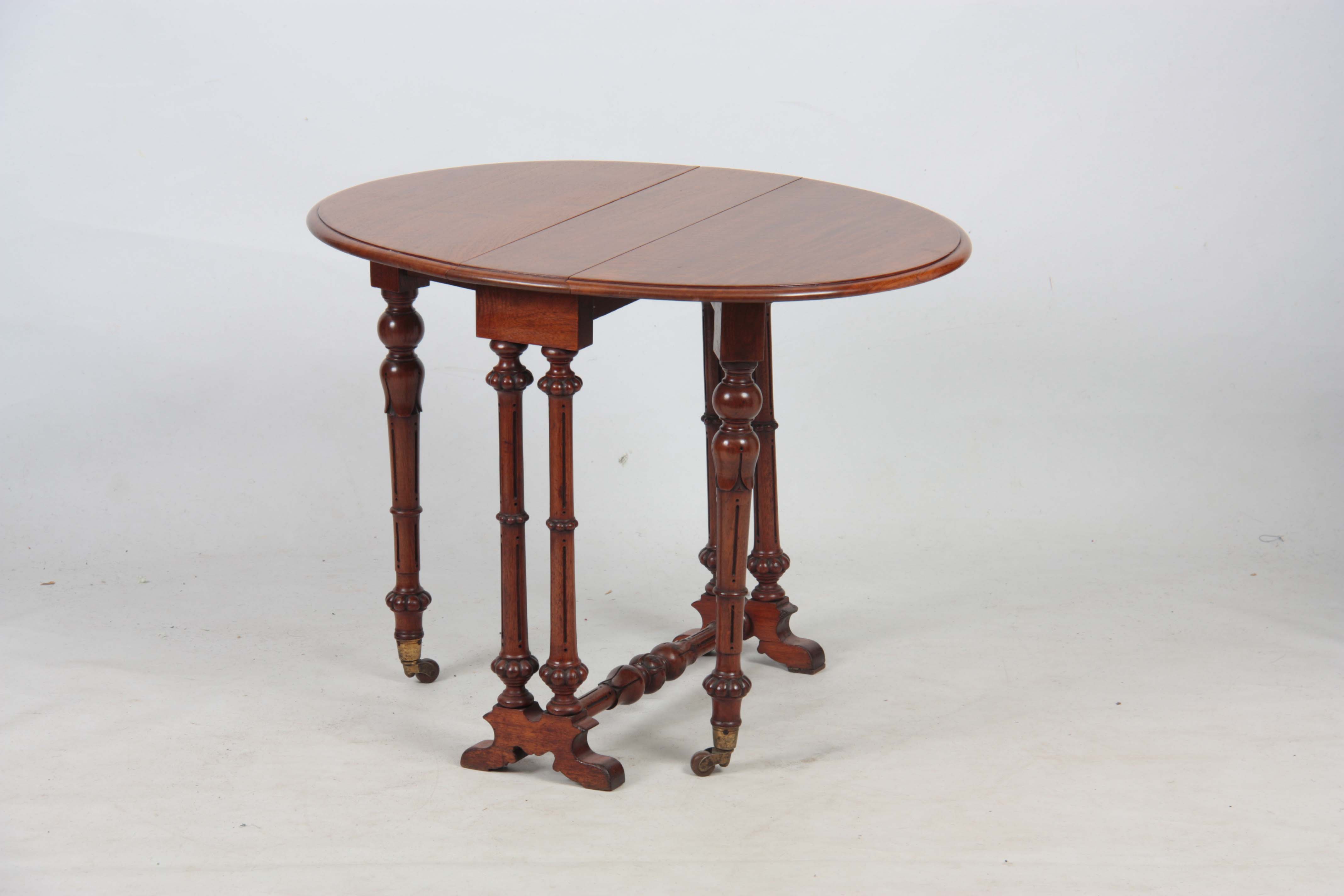 A 19TH CENTURY WALNUT MINIATURE SUTHERLAND TABLE with moulded edge oval top above a turned base with - Image 5 of 7