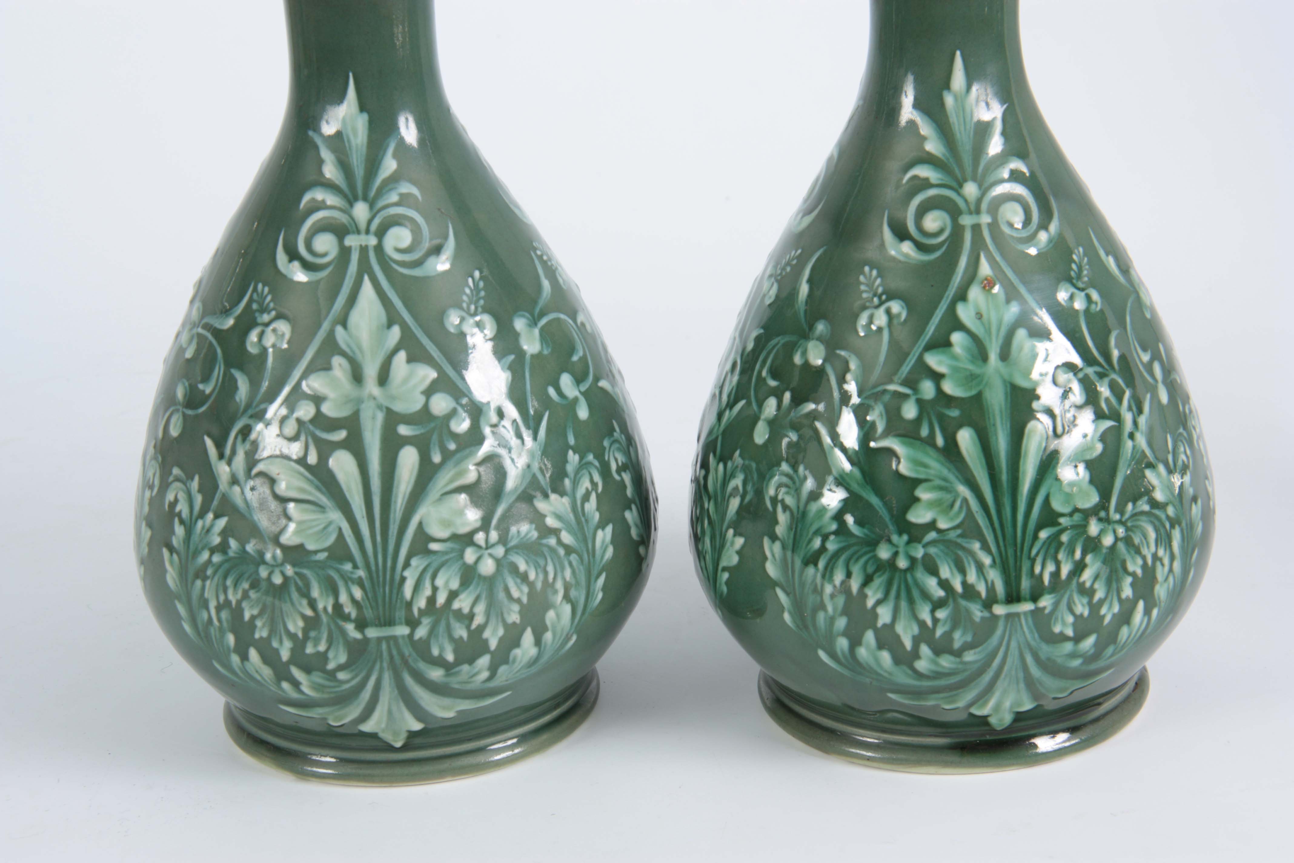 A PAIR OF 19TH CENTURY DOULTON LAMBETH PATE SUR PATE DECORATED VASES decorated with foliage - Image 2 of 3