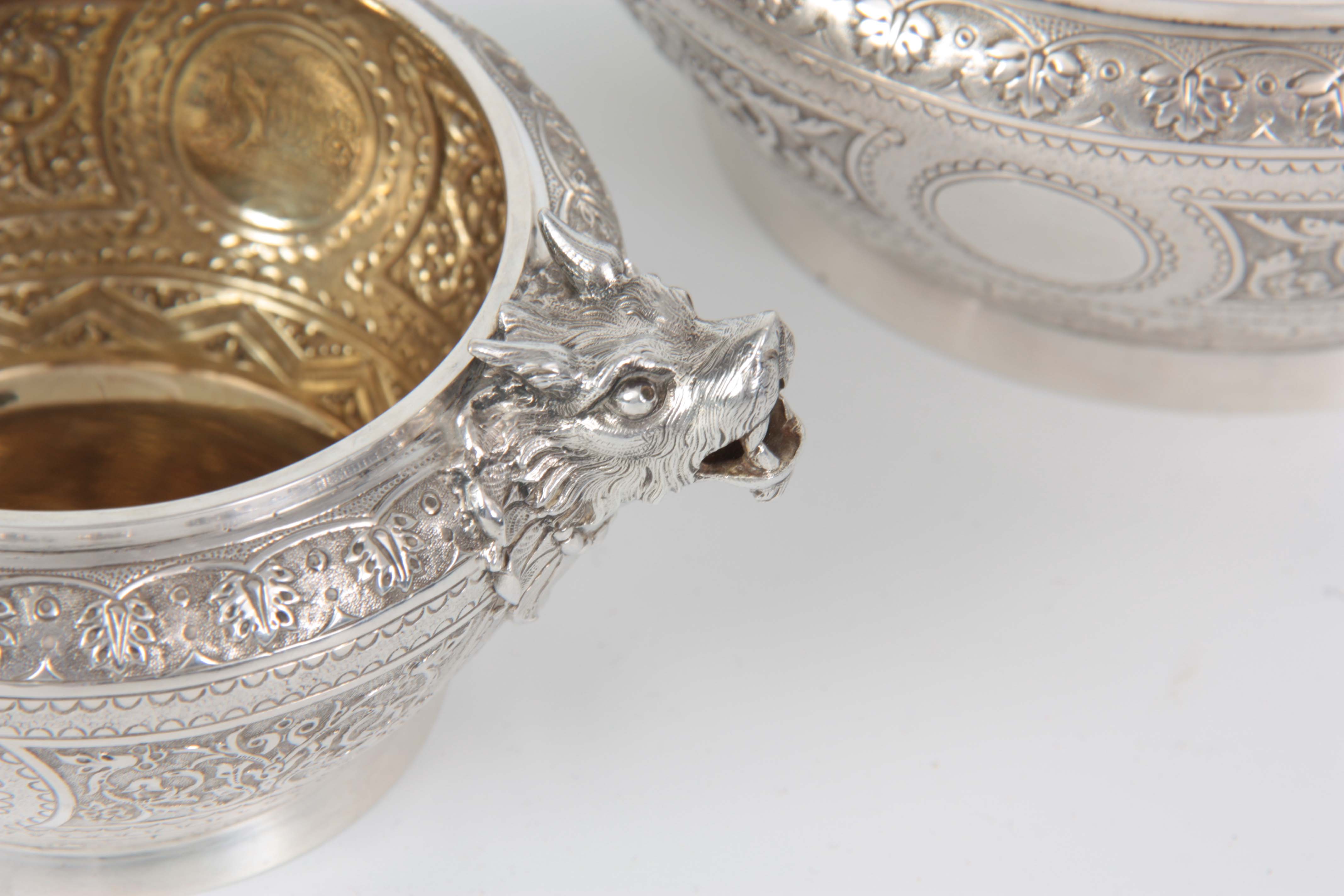 A VICTORIAN SILVER AND GILT CREAM JUG AND SUGAR BOWL having relief scroll-work panels and fine - Image 6 of 7