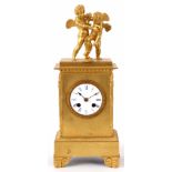 A FRENCH LATE 19th CENTURY ORMOLU MANTLE CLOCK of rectangular form with torch decoration to the