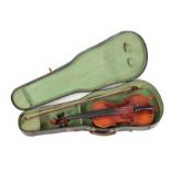 AN ANTIQUE VIOLIN length of back 36cm - sold in a viola case with a bow.