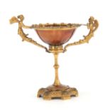 A 19th CENTURY GILT BRONZE AND AGATE GOBLET having side handles modelled as Cupid and Psyche