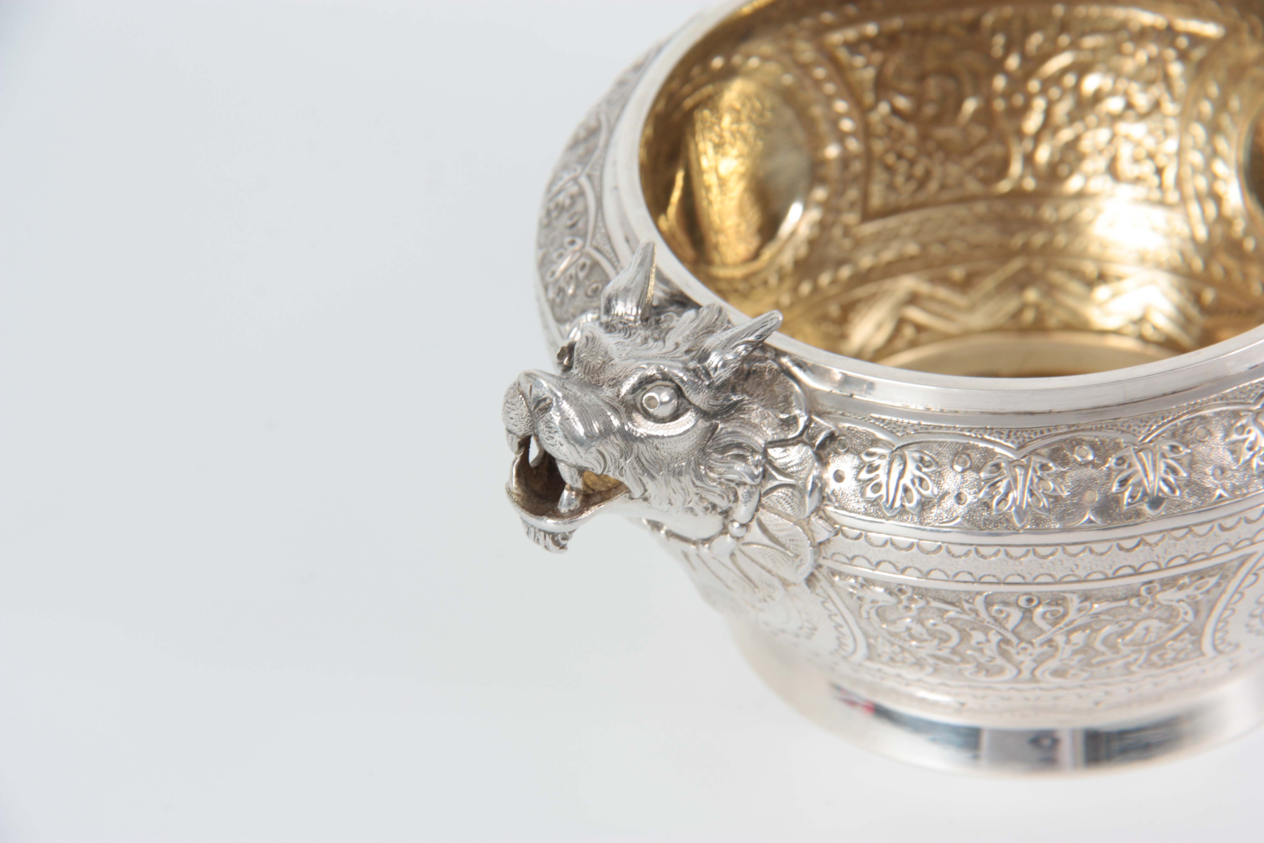 A VICTORIAN SILVER AND GILT CREAM JUG AND SUGAR BOWL having relief scroll-work panels and fine - Image 7 of 7