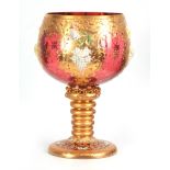 AN IMPRESSIVE VENITIAN GIANT-SIZE CRANBERRY GLASS GOBLET with richly gilt ringed tapering stem and