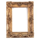 A 19th CENTURY GILT SWEPT FRAME aperture measures 27cm high, 41cm wide