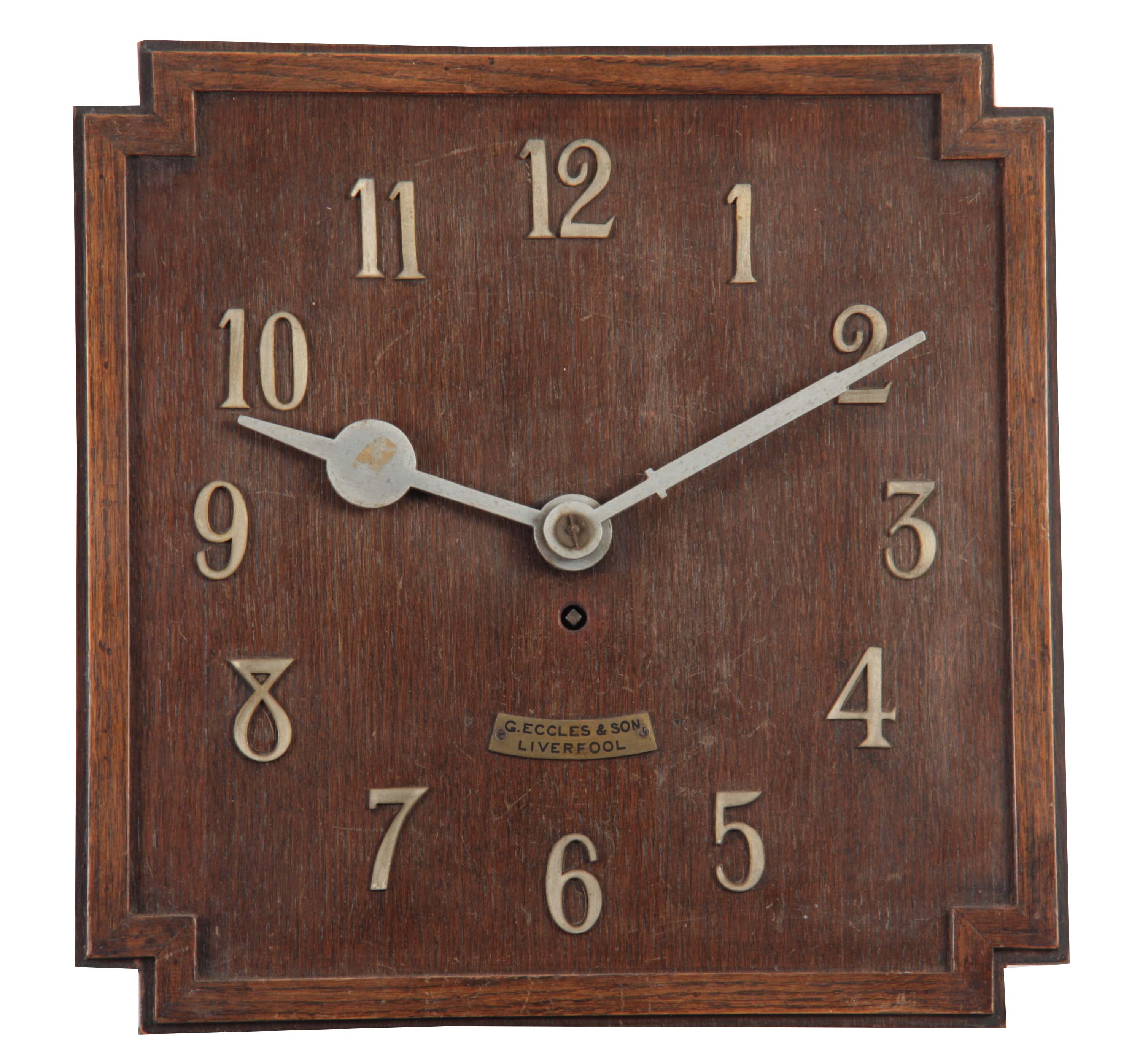 G. ECCLES & SON, LIVERPOOL. AN OAK ART DECO FUSEE WALL CLOCK the 38cm squared dial with applied