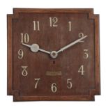 G. ECCLES & SON, LIVERPOOL. AN OAK ART DECO FUSEE WALL CLOCK the 38cm squared dial with applied