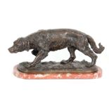 A LATE 19th CENTURY PATINATED BRONZE SCULPTURE modelled as a gun dog standing on naturalistic base