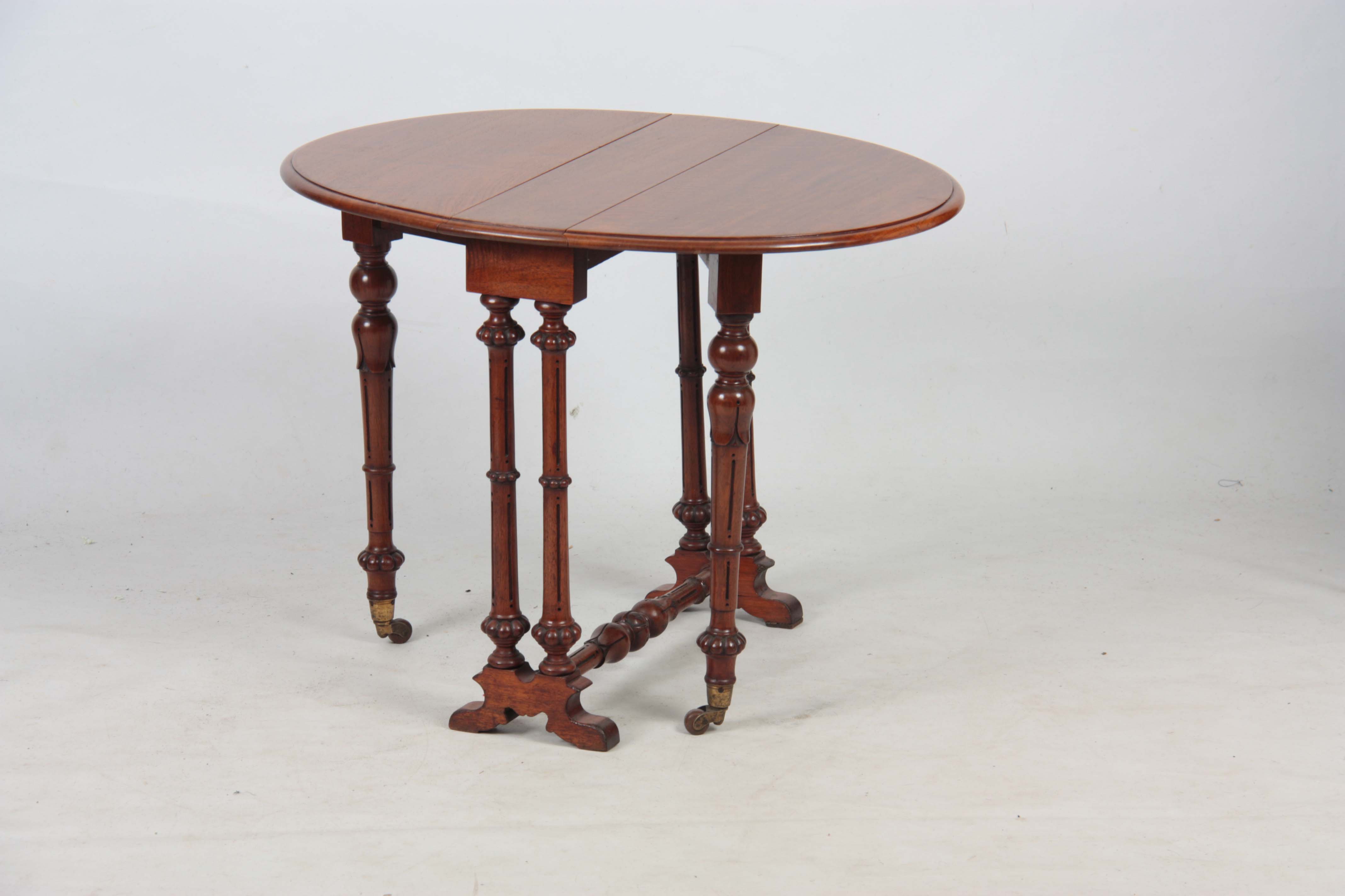 A 19TH CENTURY WALNUT MINIATURE SUTHERLAND TABLE with moulded edge oval top above a turned base with - Image 6 of 7