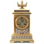 A LATE 19TH CENTURY FRENCH LACQUERED BRASS AND CHAMPLEVE ENAMEL MANTEL CLOCK with stepped leaf edged