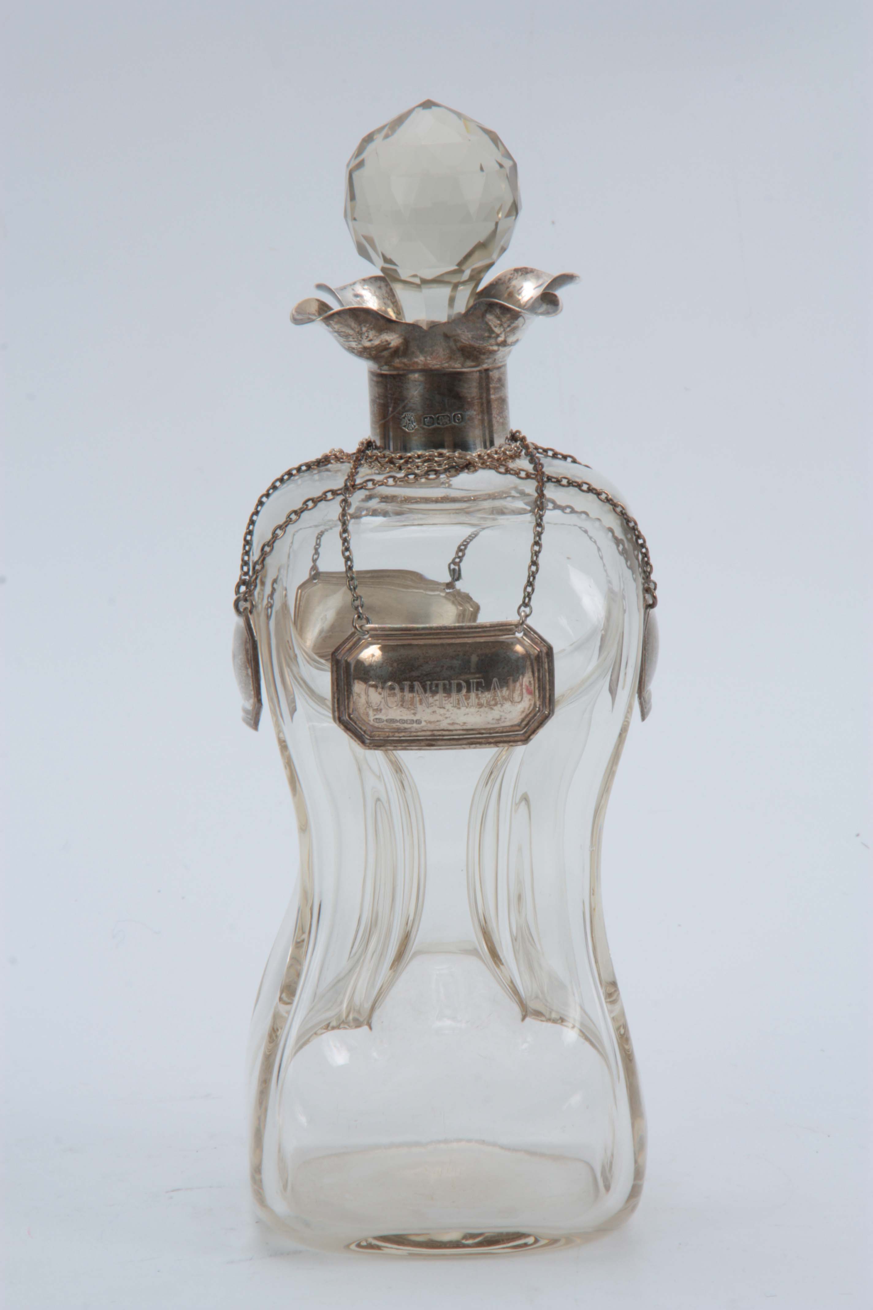 A GEORGE V SILVER MOUNTED SPIRIT DECANTER AND STOPPER with quatrefoil pouring lips and pinched clear - Image 2 of 3