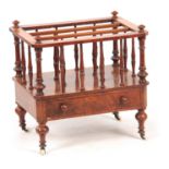 A MID 19th CENTURY BURR WALNUT CANTERBURY with turned sections above a long drawer with canted