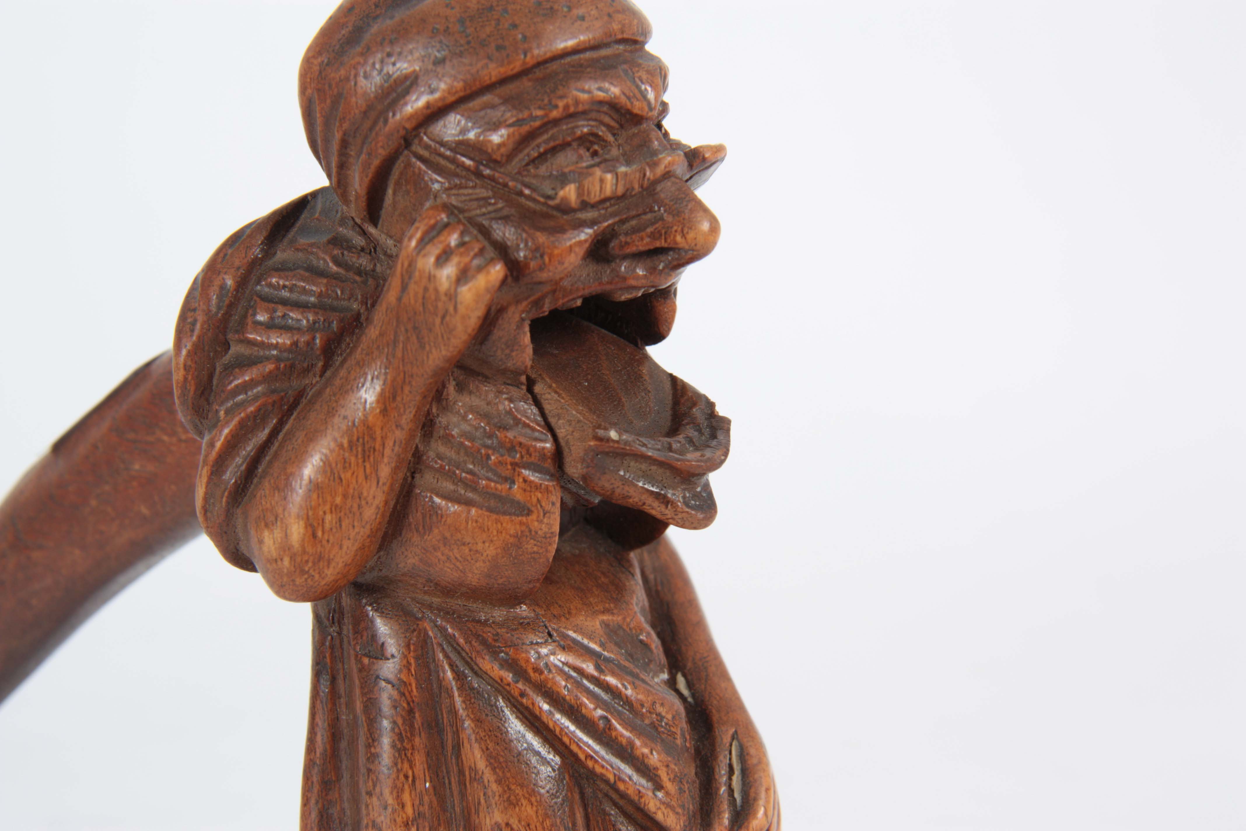 A LATE 19TH CENTURY SWISS BLACK FOREST NUTCRACKER formed as an old woman with headscarf and glasses, - Image 4 of 5