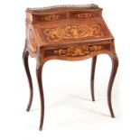 A 19TH CENTURY FRENCH LADIES ROSEWOOD AND INLAID SATINWOOD ORMOLU MOUNTED BONHEUR DU JOUR of bombe