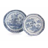 AN 18TH CENTURY CHINESE BLUE AND WHITE SHALLOW DISH with fenced garden scene and butterfly centre