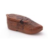 AN EARLY 19TH CENTURY CARVED BOXWOOD FOLK ART SNUFF BOX IN THE SHAPE OF A SHOE decorated with