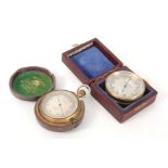 ROSS, LONDON. A BRASS CASED POCKET BAROMETER with silvered calibrated dial fitted in original
