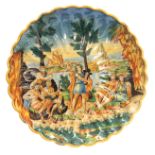 A 17TH CENTURY ITALIAN MAJOLICA POLYCHROME FLUTED FOOTED SHALLOW DISH depicted an allegorical