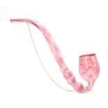 A LARGE 19TH CENTURY STOURBRIDGE GLASS PIPE of twisted pink and opaque design 50cm overall.