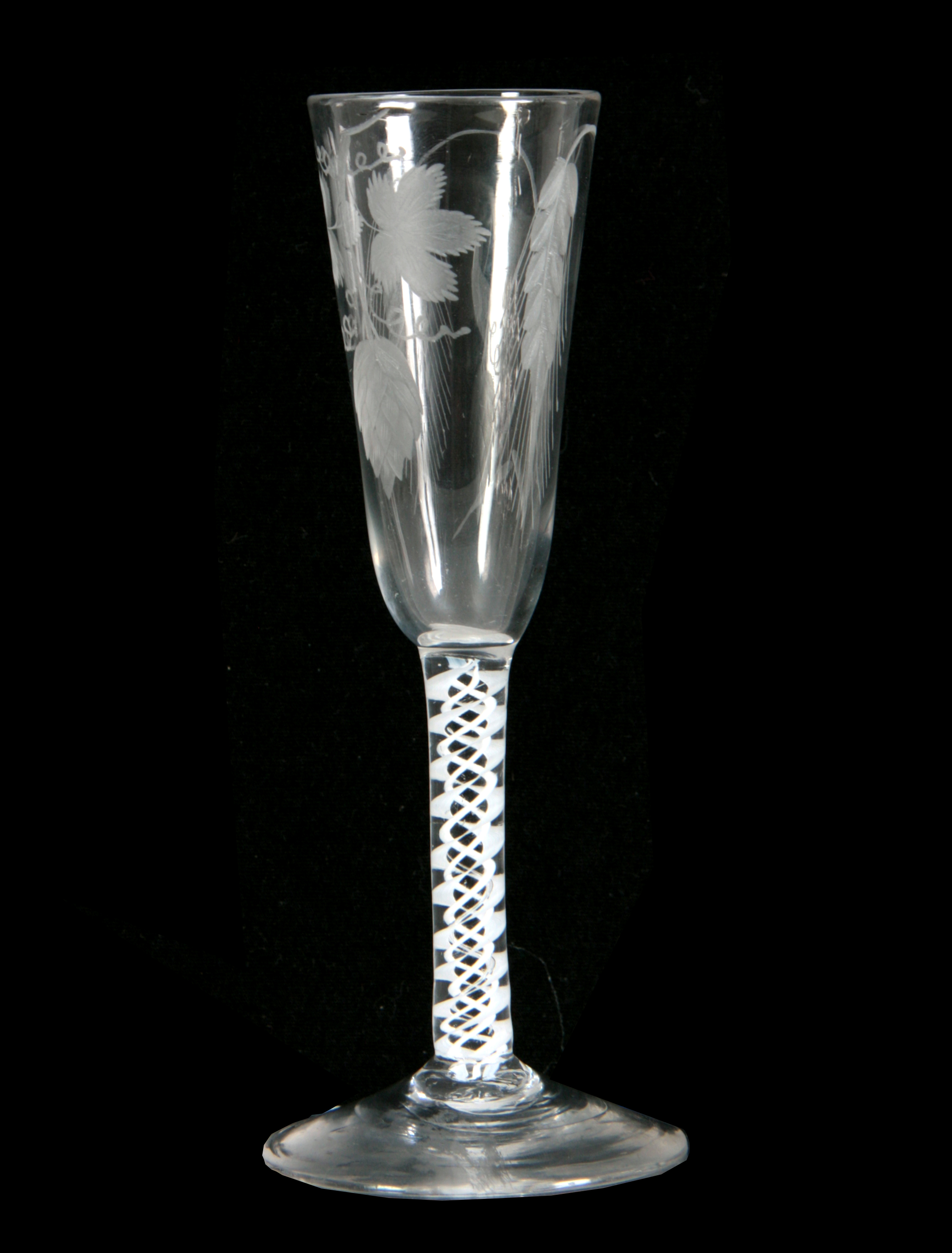 AN 18TH CENTURY TRIPLE OPAQUE AIR TWIST ALE FLUTE / WINE GLASS the bowl engraved with hops and