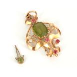 A LADIES EDWARDIAN 15CT GOLD PENDANT set with green Peridot, pink Spinel and Diamonds, 54mm high,