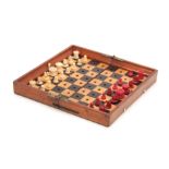 A LATE 19th CENTURY JAQUES, LONDON TRAVELLING 'IN STATU QUO' TRAVELLING CHESS SET the folding