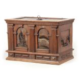 AN EARLY 17TH CENTURY CONTINENTAL WALNUT STONG BOX / CASKET the panelled top fitted with an