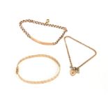 THREE 9CT GOLD BRACELETS to include a tri-coloured bracelet, a locket bracelet, and a chain bracelet
