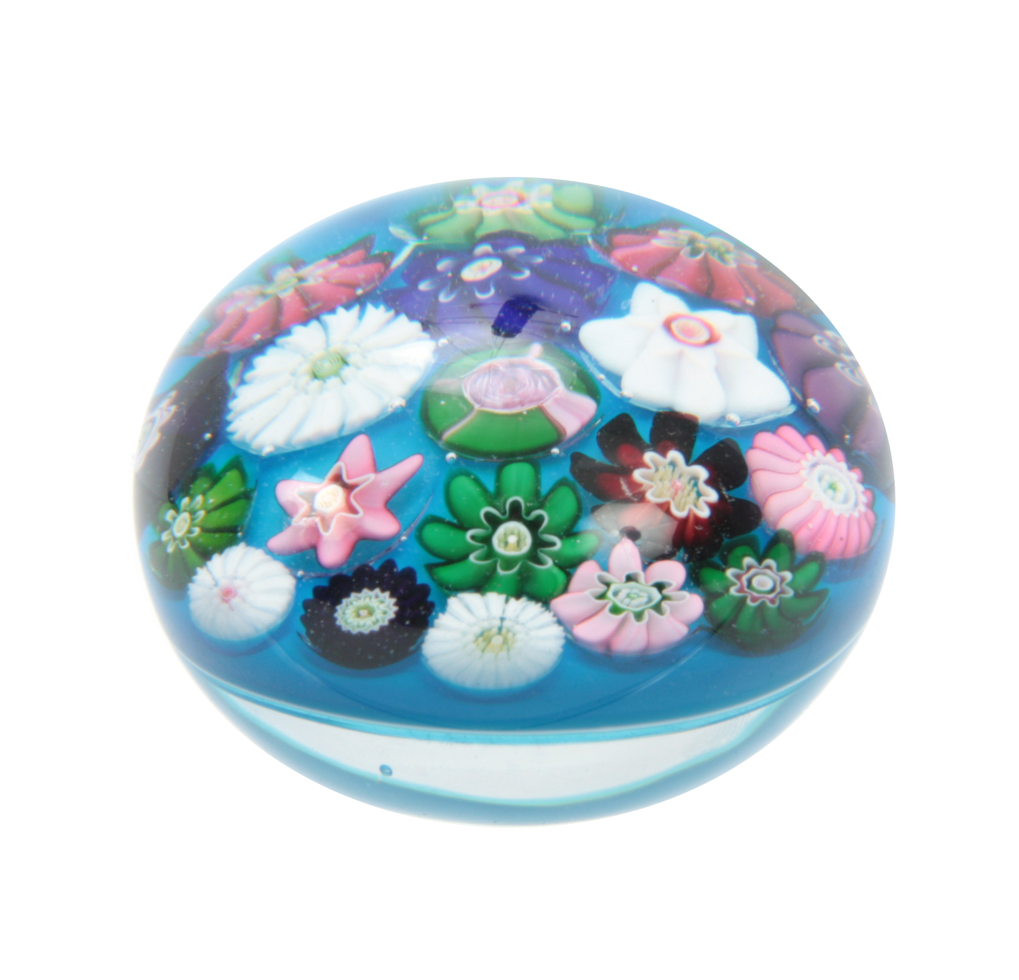 A MID 19TH CENTURY CLICHY PAPERWEIGHT turquoise ground decorated with flower heads 6cm diameter.