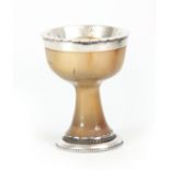 AN 18th CENTURY SILVER MOUNTED CHALCEDONY STEM CUP of mushroom colour with light brown inclusions